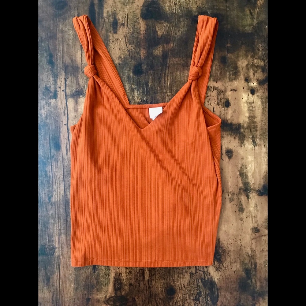 Orange/ Rust colored top